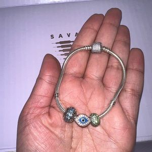 Pandora bracelet including all three charms.